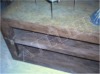 Table basse en bois recouverte d'enduit béton