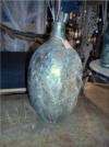Vase entièrement recouvert d'un enduit béton mélangé à des pigments naturels.